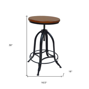 Homeroots 23" Chestnut And Black Steel Swivel Backless Adjustable Height Bar Chair   516177