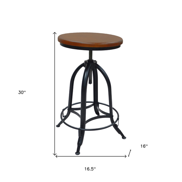 Homeroots 23" Chestnut And Black Steel Swivel Backless Adjustable Height Bar Chair   516177