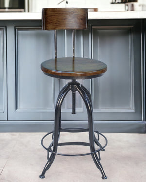 Homeroots 23" Chestnut And Black Steel Swivel Low Back Adjustable Height Bar Chair   516179