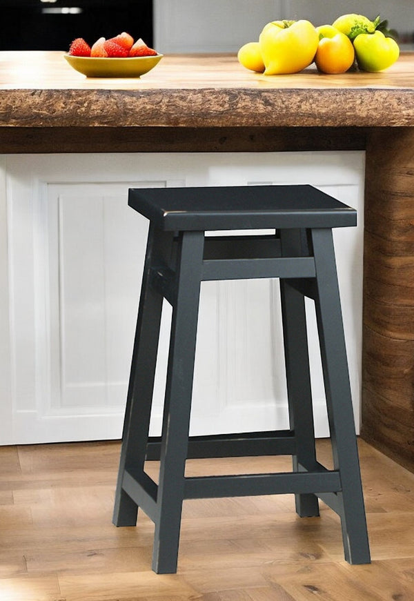 Homeroots 24" Black Solid Wood Backless Counter Height Bar Chair   516189