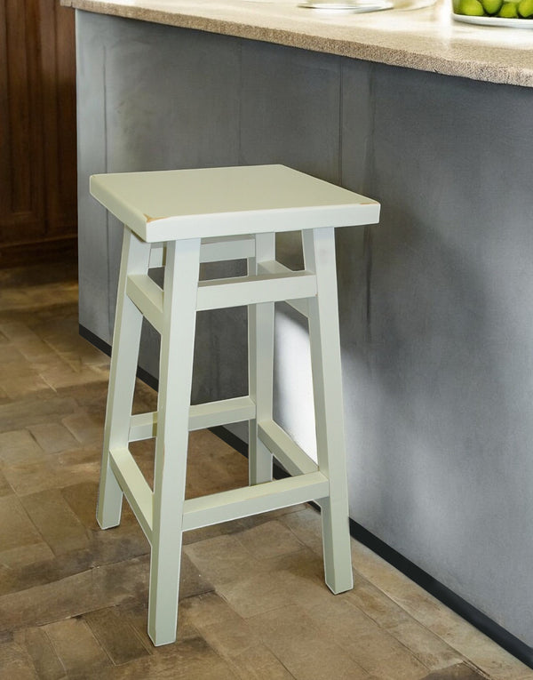 Homeroots 24" Antiqued White Solid Wood Backless Counter Height Bar Chair   516190