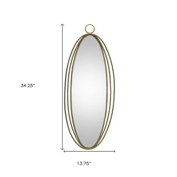 Homeroots 34" Gold Oval Metal Framed Accent Mirror   516379