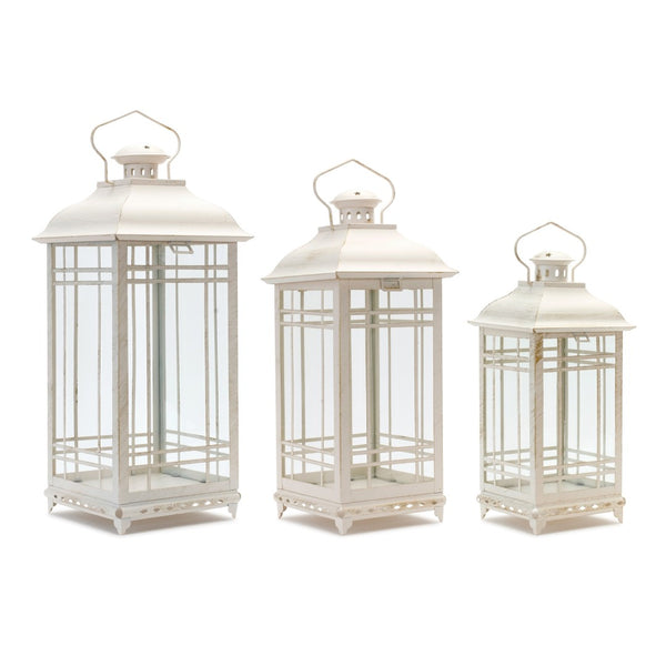 HomeRoots Set of Three Elegant Ivory Metal Mirrored Floor Lantern Candle Holders for Timeless Décor Style 516433