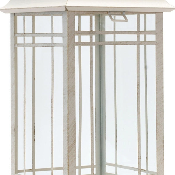 HomeRoots Set of Three Elegant Ivory Metal Mirrored Floor Lantern Candle Holders for Timeless Décor Style 516433
