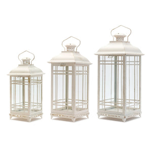 HomeRoots Set of Three Elegant Ivory Metal Mirrored Floor Lantern Candle Holders for Timeless Décor Style 516433