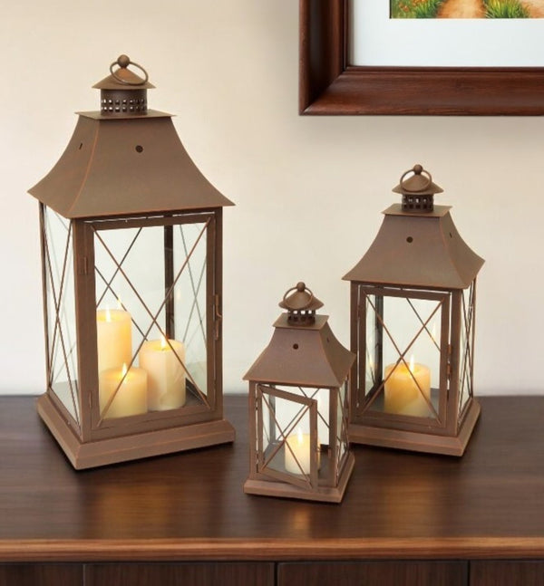 Homeroots Set Of Three Brown Glass And Metal Lattice Floor Lantern Candle Holders   516436