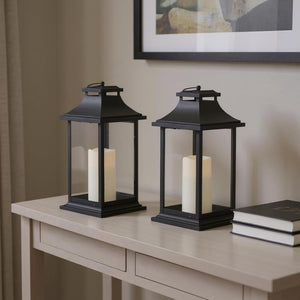 HomeRoots Set of Two Elegant Black Floor Lantern Candle Holders with LED Candles for Warm Ambiance 516437