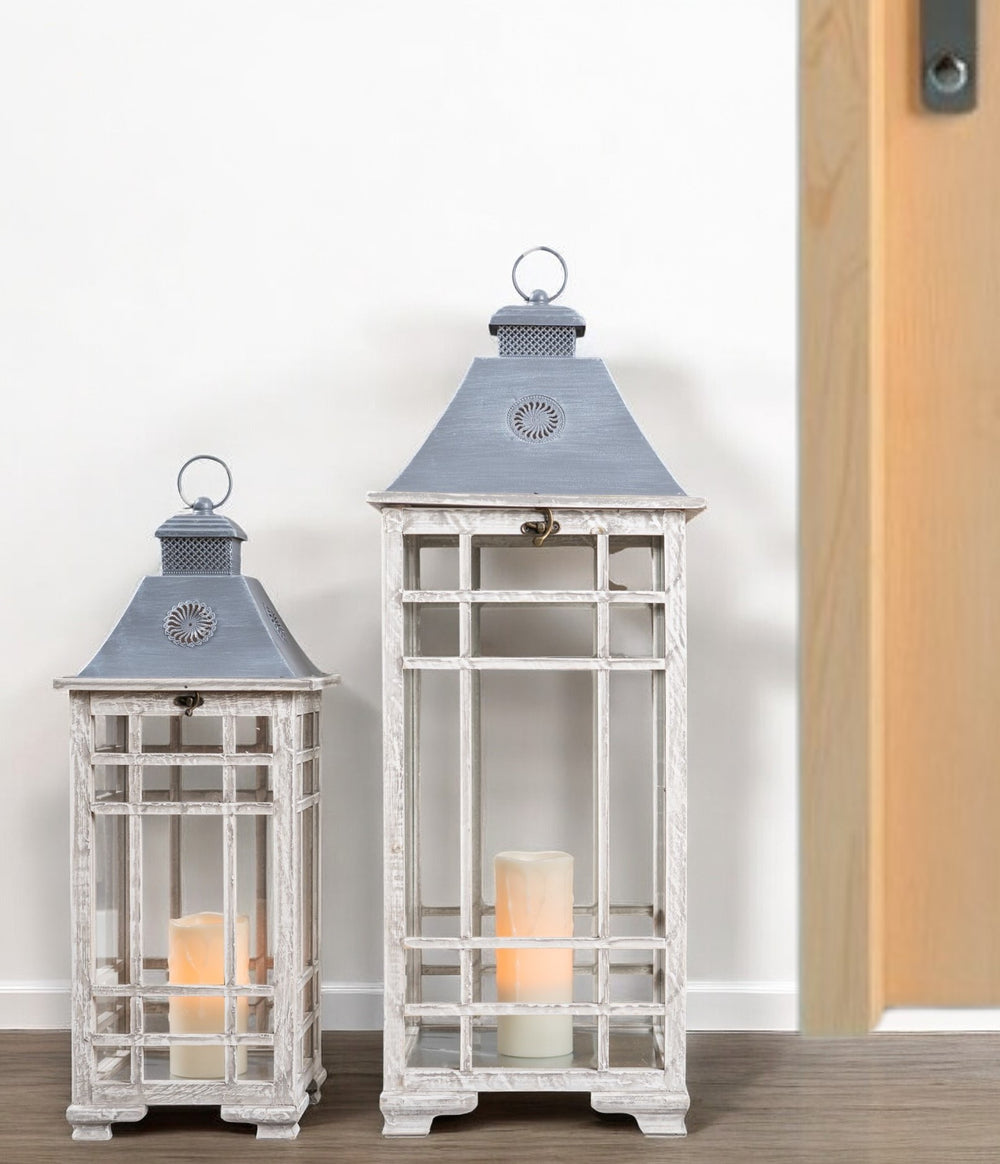 Homeroots Set Of Two White And Silver Metal Geometric Floor Lantern Candle Holders   516446