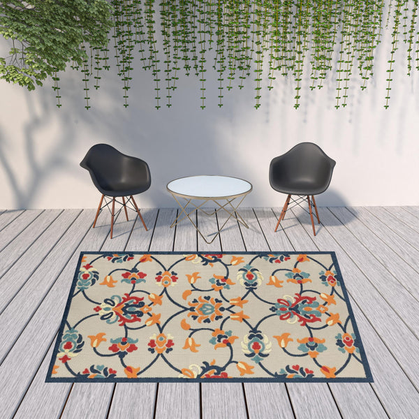 Homeroots 8' X 10' Blue And Orange Floral Non Skid Indoor Outdoor Area Rug Navy,Orange,Red,Off,White Polypropylene 517454