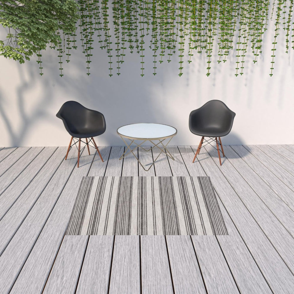 HomeRoots 5' Gray and Ivory Striped Area Rug - Durable, Stylish Design for Indoor and Outdoor Living Spaces 5' x 7' 517494