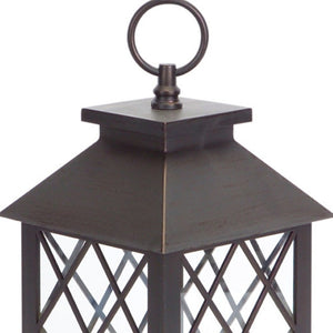 HomeRoots Set of Three Dark Brown Distressed Lantern Candle Holders with Ornate Design – Perfect for Any Space! 517555