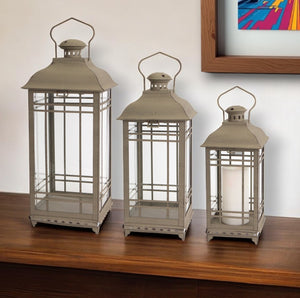 Homeroots Set Of Three Brown Glass And Metal Geometric Floor Lantern Candle Holders   517558