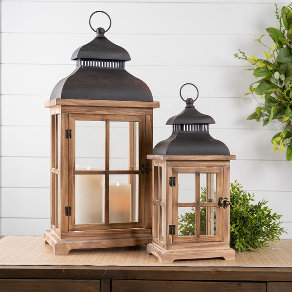 Homeroots Set Of Two Natural And Black Glass Wood And Metal Floor Lantern Candle Holders   517559