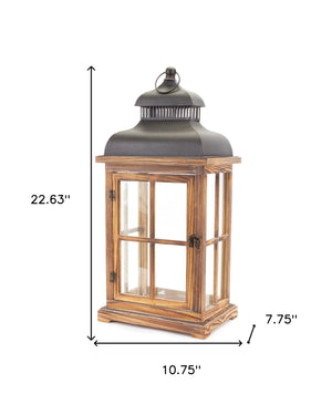 Homeroots Set Of Two Natural And Black Glass Wood And Metal Floor Lantern Candle Holders   517559