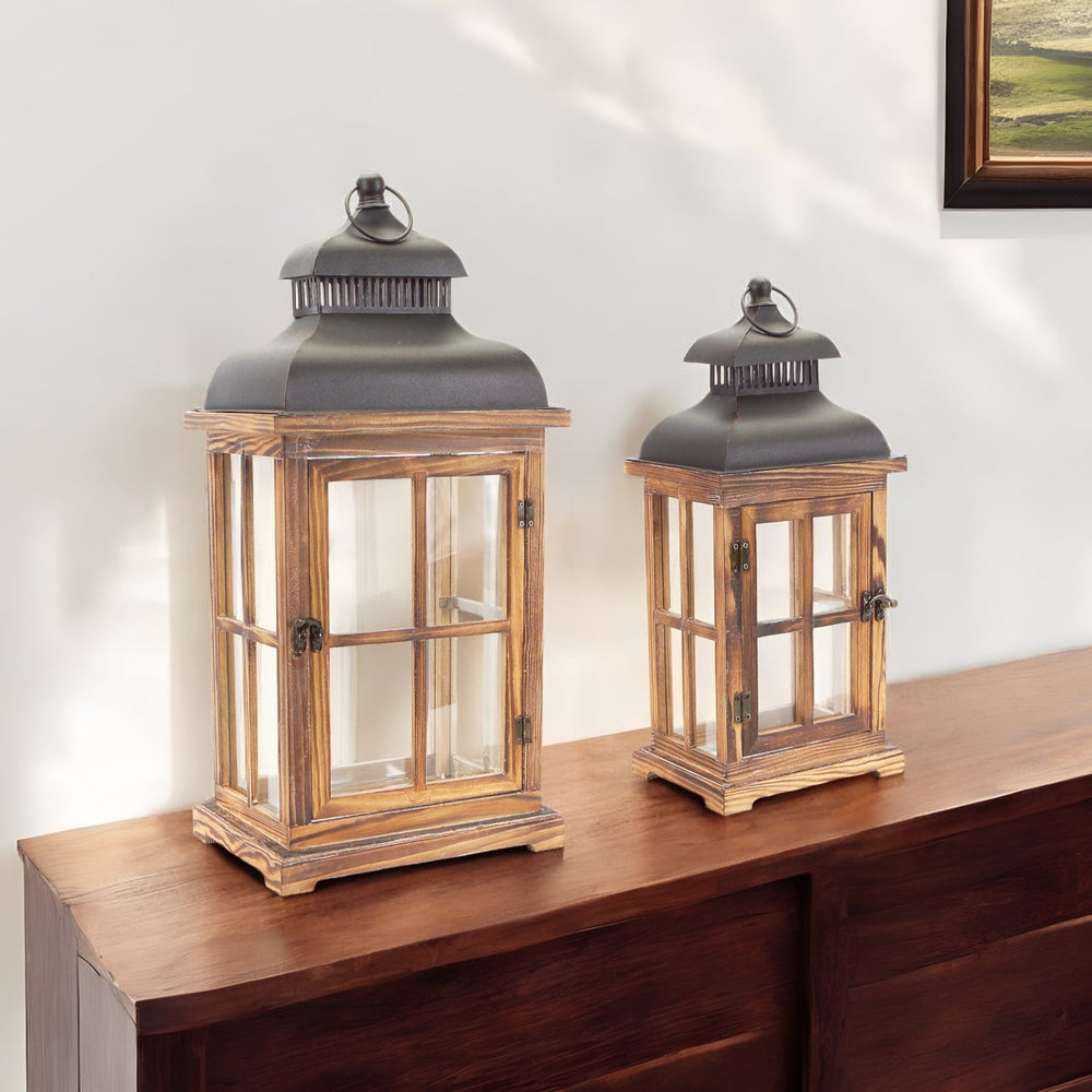 Homeroots Set Of Two Natural And Black Glass Wood And Metal Floor Lantern Candle Holders   517559