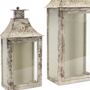 Homeroots Set Of Two Beige Iron And Glass Filigree Floor Lantern Candle Holders   517564