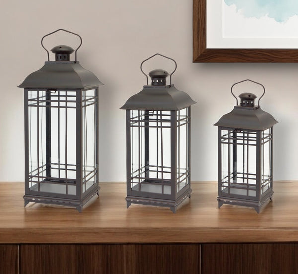 Homeroots Set Of Three Black Glass And Metal Geometric Floor Lantern Candle Holders   517567