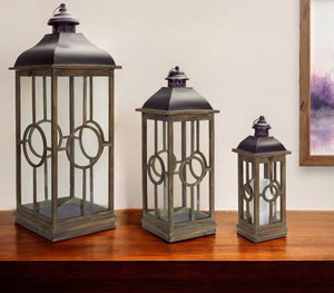 Homeroots Set Of Three Brown And Black Metal And Wood Geometric Floor Lantern Candle Holders   517571