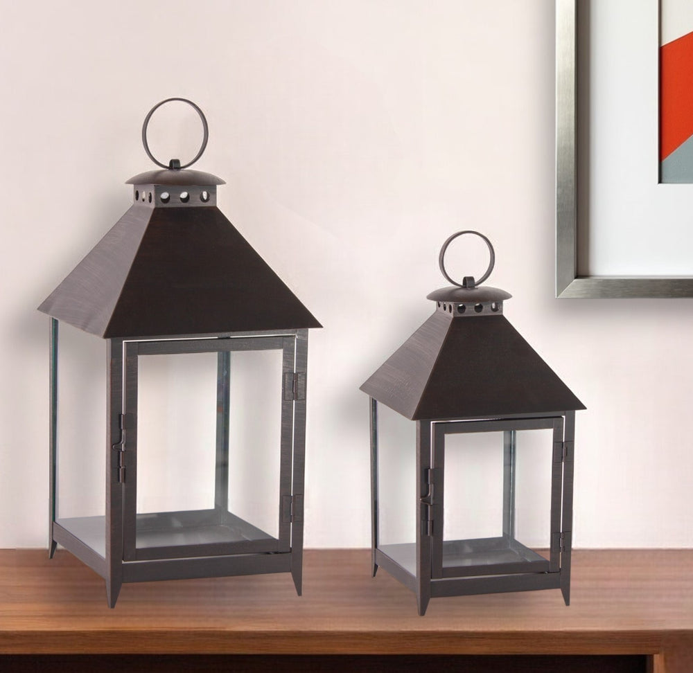 Homeroots Set Of Two Black Iron And Glass Geometric Floor Lantern Candle Holders   517596