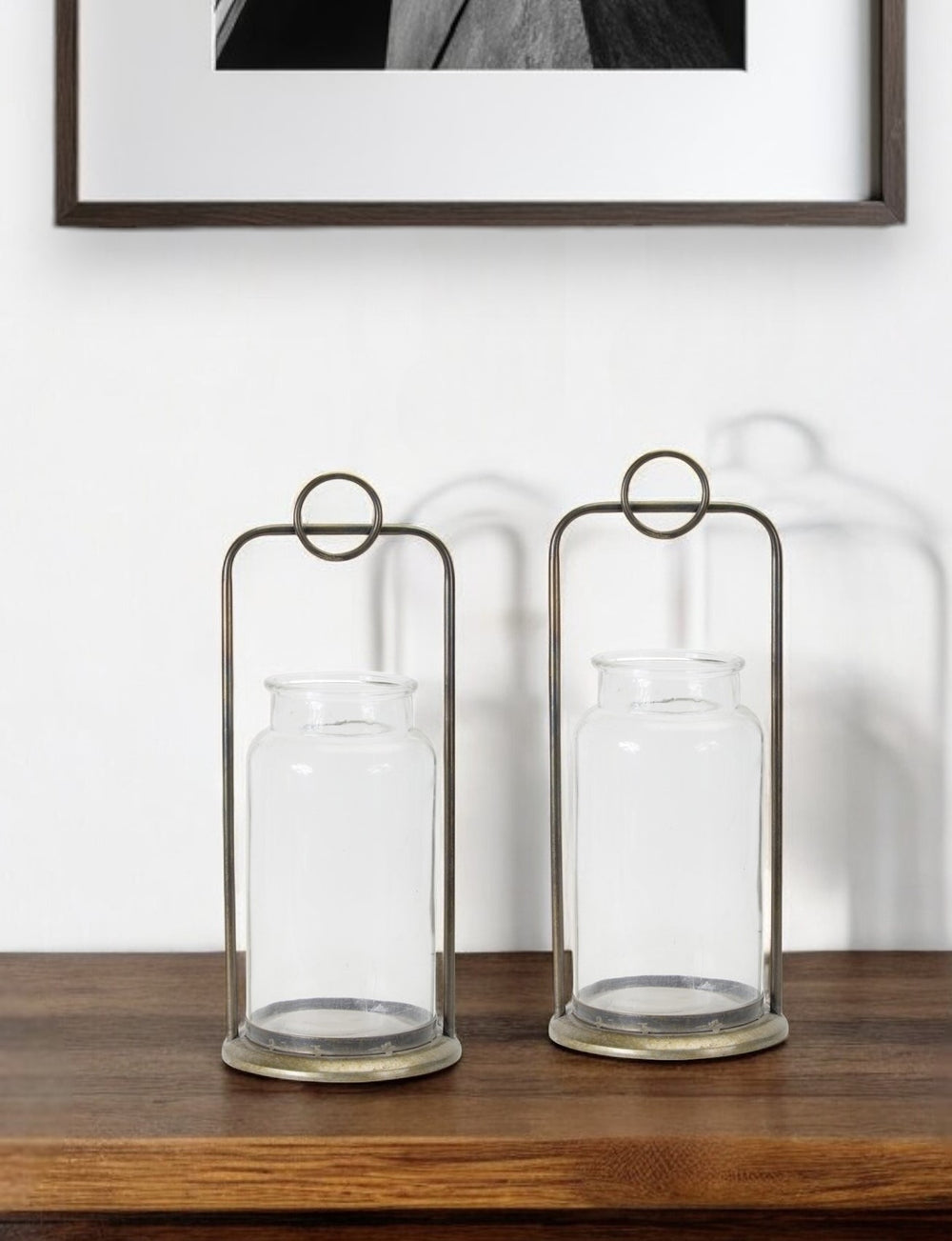 Homeroots Set Of Two Bronze Metal And Glass Tabletop Hurricane Candle Holders   517597