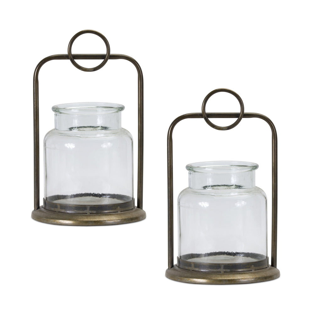 Homeroots Set Of Two Bronze Glass And Metal Tabletop Hurricane Candle Holders   517598