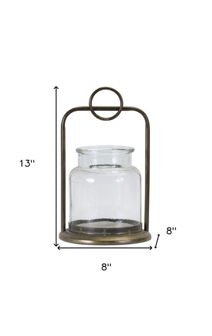 Homeroots Set Of Two Bronze Glass And Metal Tabletop Hurricane Candle Holders   517598