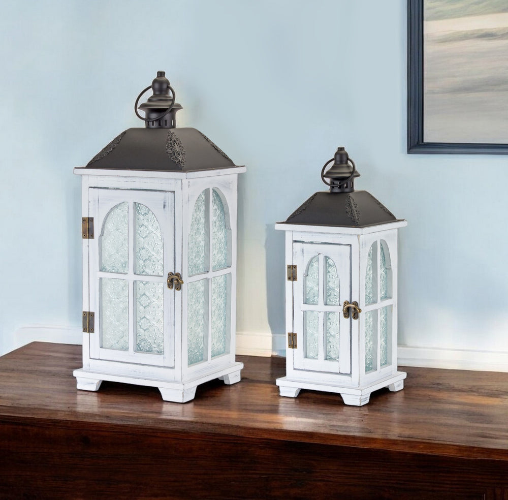 Homeroots Set Of Two White And Black Glass Wood And Metal Ornate Floor Lantern Candle Holders   517616