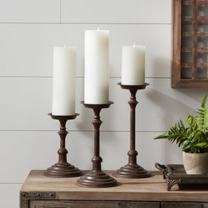 Homeroots Set Of Three Brown Rustic Resin Tabletop Pillar Candle Holders   517622