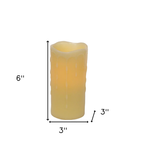 Homeroots Set Of Four Yellow Flameless Pillar Candle  Wax 517648