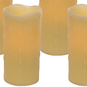 Homeroots Set Of Four Yellow Flameless Pillar Candle  Wax 517648
