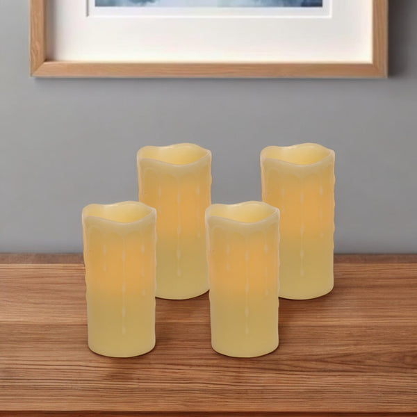 Homeroots Set Of Four Yellow Flameless Pillar Candle  Wax 517648