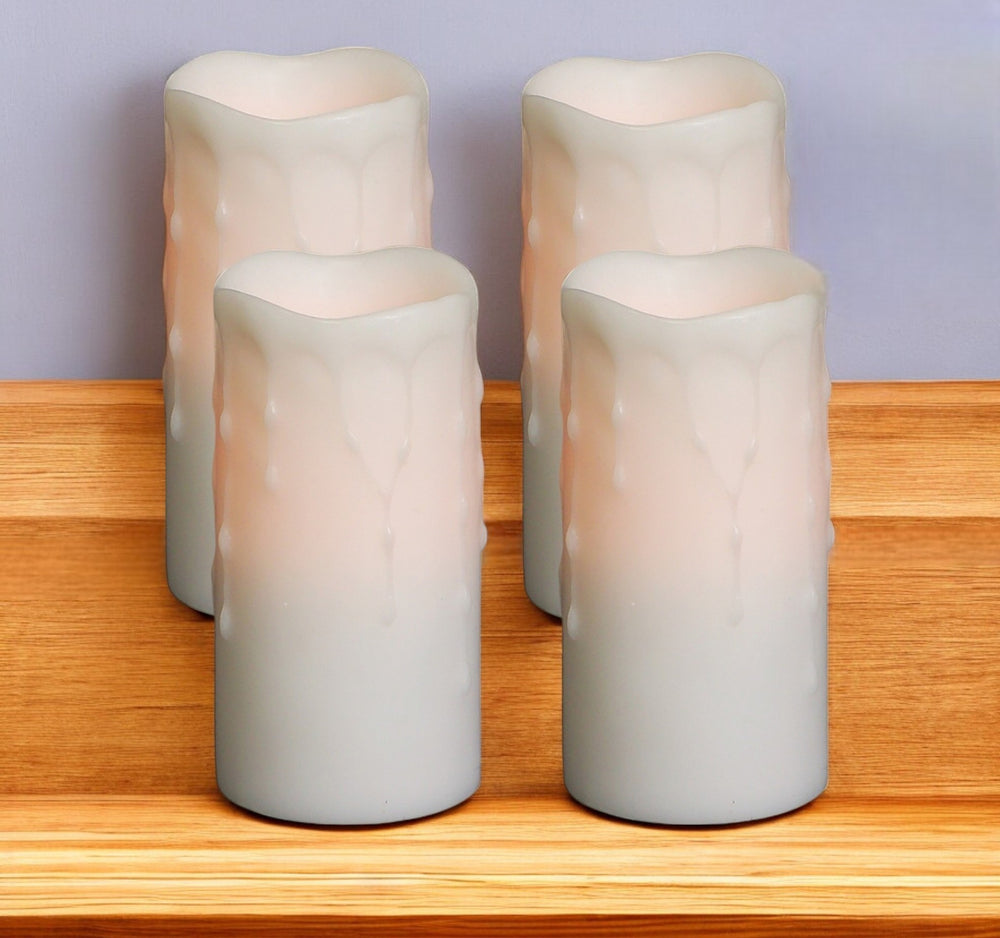Homeroots Set Of Four Off White Flameless Pillar Candles  Wax 517650
