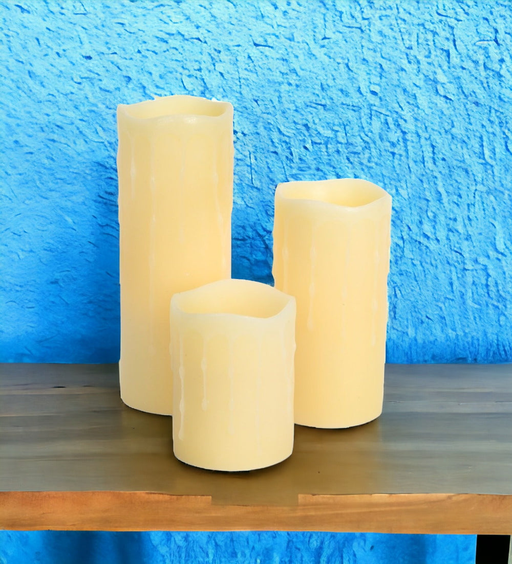 Homeroots Set Of Three Yellow Flameless Pillar Candle  Wax 517652
