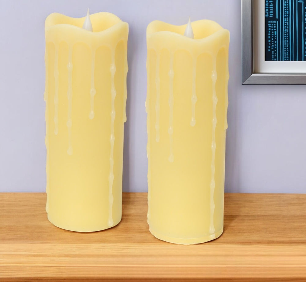 Homeroots Set Of Two Yellow Flameless Pillar Candles  Wax 517655