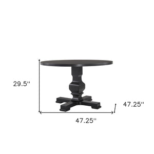 Homeroots 47" Black Rounded Solid Wood Pedestal Base Dining Table   517746