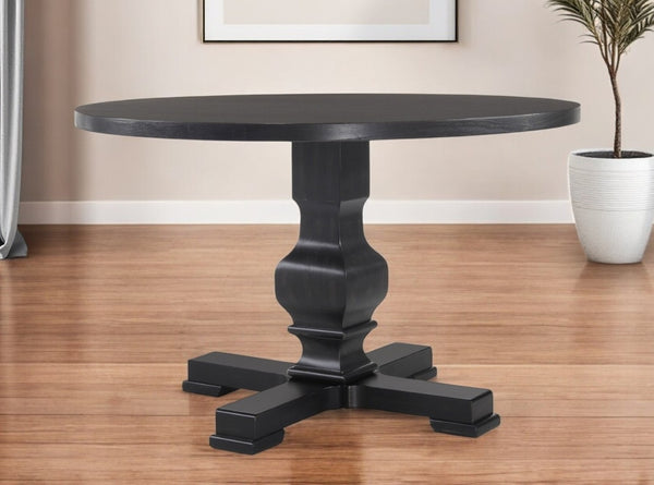 HomeRoots 47" Black Rounded Solid Wood Pedestal Table – Stylish, Durable, and Perfect for Cozy Family Gatherings 517746