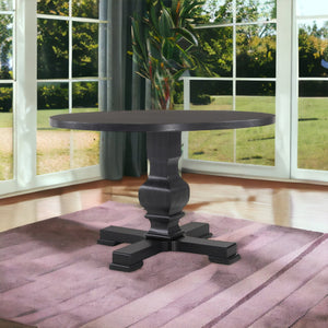 Homeroots 47" Black Rounded Solid Wood Pedestal Base Dining Table   517746
