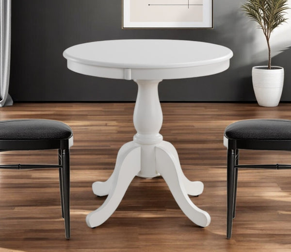 HomeRoots 30" Elegant White Round Pedestal Dining Table for Small Spaces – Timeless Vintage Charm & Durability 517750