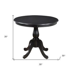 Homeroots 36" Black Rounded Solid Manufactured Wood And Solid Wood Pedestal Base Dining Table   517751
