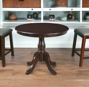 Homeroots 36" Espresso Rounded Solid Manufactured Wood And Solid Wood Pedestal Base Dining Table   517752