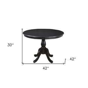 Homeroots 42" Black Rounded Solid Manufactured Wood And Solid Wood Pedestal Base Dining Table   517754