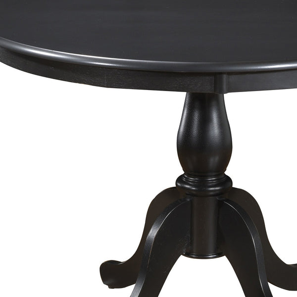 Homeroots 42" Black Rounded Solid Manufactured Wood And Solid Wood Pedestal Base Dining Table   517754