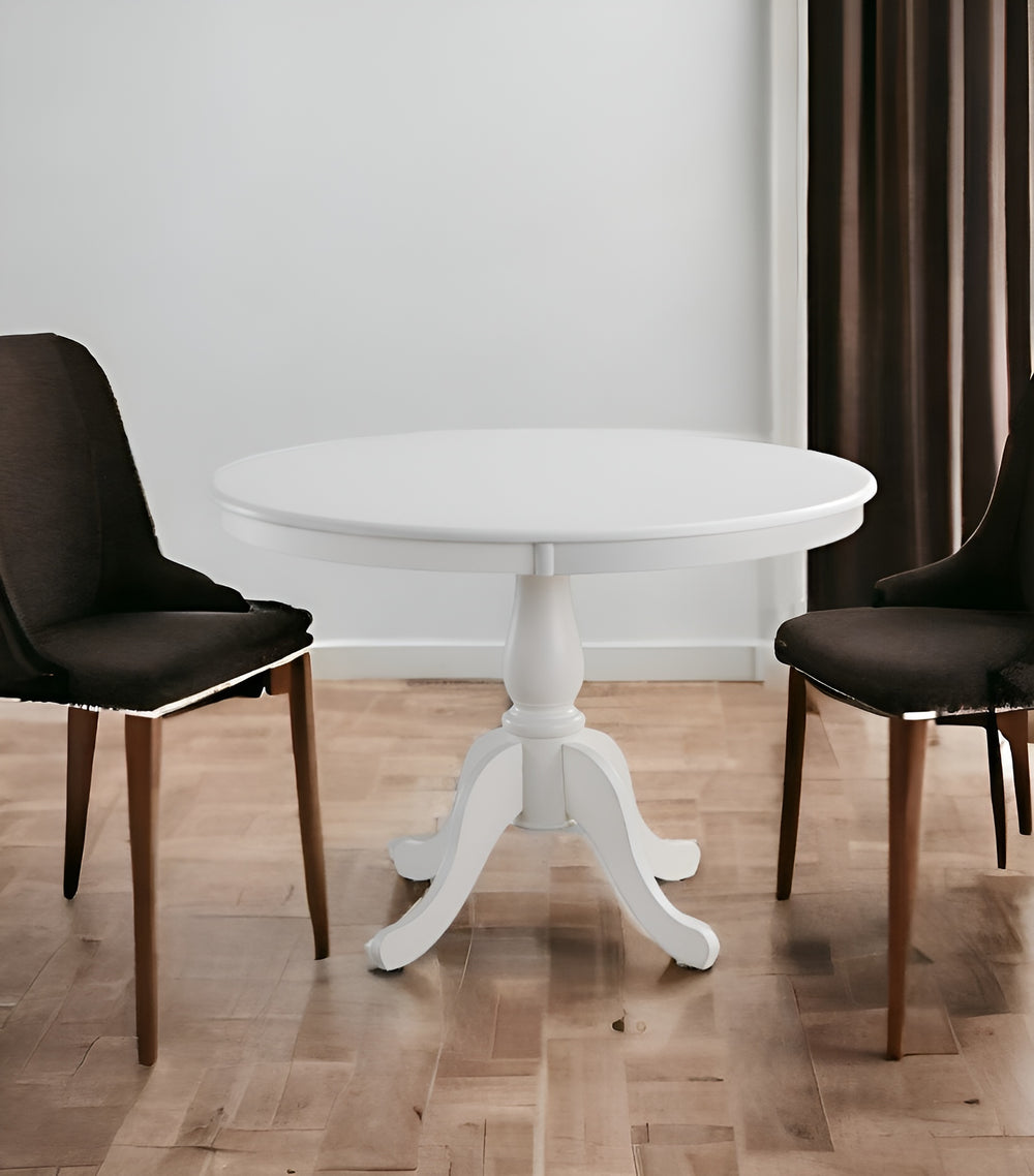 Homeroots 42" White Rounded Solid Manufactured Wood And Solid Wood Pedestal Base Dining Table   517756