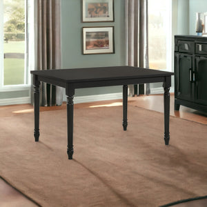 Homeroots 48" Black Solid Wood Dining Table   517757