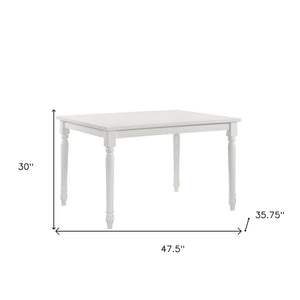 Homeroots 48" White Solid Wood Dining Table   517758