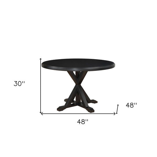 Homeroots 48" Black Rounded Solid Manufactured Wood And Solid Wood Pedestal Base Dining Table   517759