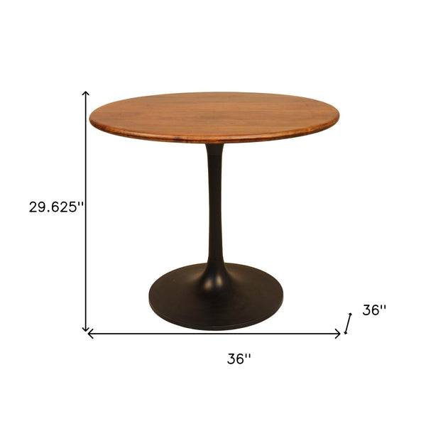 Homeroots 36" Brown And Black Rounded Solid Wood And Iron Pedestal Base Dining Table   517768