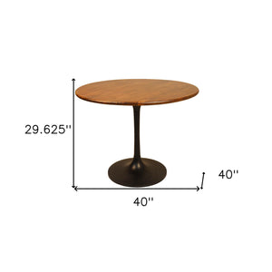 Homeroots 40" Brown And Black Rounded Solid Wood And Iron Pedestal Base Dining Table   517770