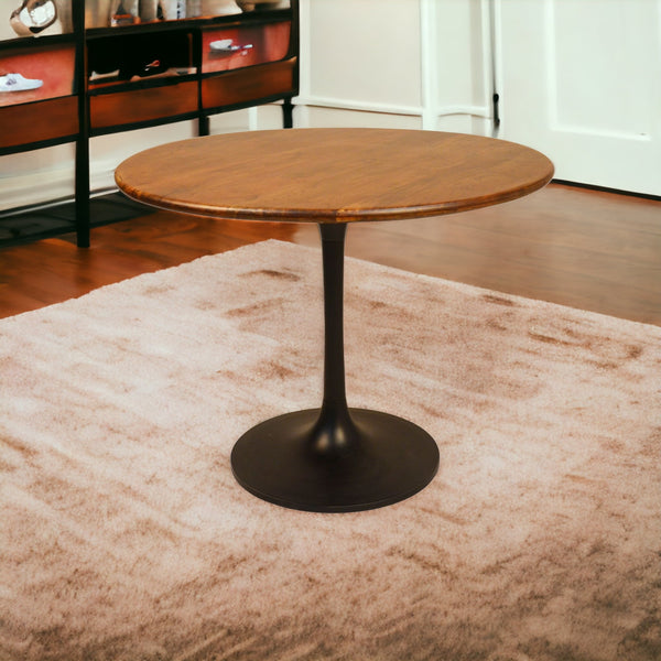 Homeroots 40" Brown And Black Rounded Solid Wood And Iron Pedestal Base Dining Table   517770