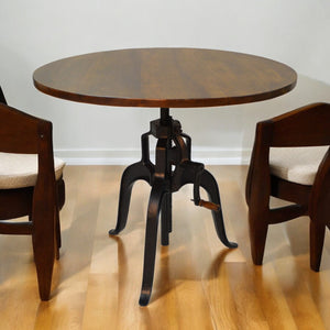 Homeroots Adjustable Height Brown And Black Solid Wood And Iron Pedestal Base Round Top Dining Table   517843